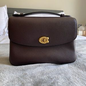 Coach Cassie Oxblood